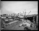 BARBARA CATES at dock with shingles, 1936, #8203_1