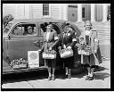 V. F. W. Buddy Poppies and four women with car , 5/18/1937, #14907_1