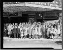 Twins group under theatre marquee, 6/4/1937, #14942_1