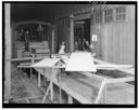 Men loading plywood into railroad car, 9/30/1944, #21079_1