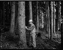 Bob Zeller measuring trees, 3/24/65, #47817_1