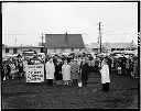 Group with umbrellas at Calvary Lutheran Church groundbreaking, 3/28/65, #47823_1