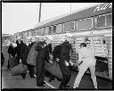 Naval Reserve group leaving for training, loading bus, 6/12/65, #48180_1