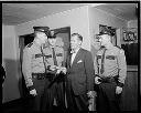 Officers Chancellor, Marrs, and Ryan with tickets for Police Department Ball, 2/4/66, #49652_1