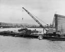 Crane lifts car, Chehalis River Bridge collapse, 1/3/54, #28102_1