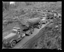 10 log trucks with one log loads, east Fork of Humptulips, 4/22/55, #29171B_1