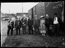 Group of people with railroad car, 8/1925, #10255_1