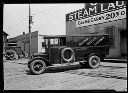 Gloss Steam Laundry truck and garage, circa 1925, #10687_1