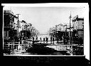 Rowboat near Heron Street Bridge looking west during flood, circa 1900, #4714_1