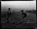 Two football players on field, 10/31/1930, #12055_1