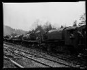 Locomotive and cars with big logs, 3/21/1931, #12243_1