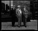 Werner Rupp, Col. W.W. Robertson, Hon. Albert Johnson in front of Daily World, 8/1931, #12469_1