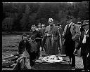 Governor Clarence D. Martin and Indian children with salmon catch, 4/22/1933, #13011_1