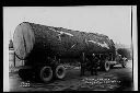 Two men with big sitka spruce log on truck, circa 1933, #5053_1