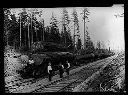 Men with logs on railroad cars, Labor Day 1922, #5092_1