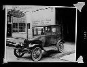 Grays Harbor Equipment Co. office with Bob Isaacson in Model T Ford, circa 1928, #6009_1