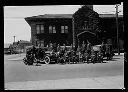 Aberdeen police officers and others with vehicles in front of building, 1925, #6158_1