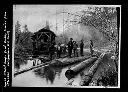 Logging crew, including Daniel O. Sjolseth, with road donkey and turn of logs, circa 1899, #6202_3