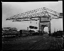 Unloading logs, 12/23/1938, #8227_1