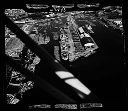 Aerial view of industrial development area, waterfront, 8/24/64, #46893_1