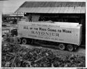 Loading wood chips into truck, 11/27/53, #28008_1