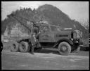 Morrison Logging Co. truck with man, 3/8/55, #28996_1