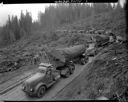 10 log trucks with one log loads, east Fork of Humptulips, 4/22/55, #29174_1