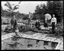 Family at garden pond, F.W. Byles residence, 8/11/1929, #11514_1