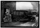 Loading newspapers onto trucks, 1926, #2063_1