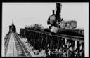 Dumping granite boulders at South Jetty, 8/15/1938, #3284_1