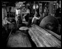 Four men in sawmill interior, 8/16/1934, #13598_1