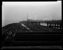 Anderson & Middleton dock with log boom, 3/24/1937, #14825_1