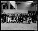 Sheet of plywood with group of men and women , 8/21/1937, #14987_1