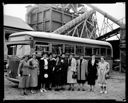 Group of women at American Door Co. with bus, 8/26/1937, #14994_1