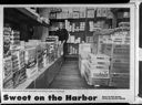 Olympic Candy Co., warehouse interior with Evelyn Martinsen, 12/18/1984, #69175_4