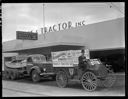 A. George Sutcliffe in 1905 truck in front of Truck & Tractor Inc., 8/27/1938, #15872_1