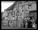 Women in vintage clothes with parade float ENTERPRISE, 8/1/1939, #16559_1