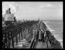 Group on jetty with ship DAN C. KINGMAN, 9/13/1939, #16701_1