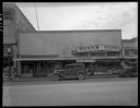 Dunn's Market exterior and O & O Shoe Repair shop, 4/16/1940, #17169_1