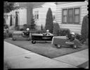 Three boys in Soap Box Derby cars, 7/11/1940, #17390_1