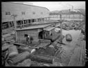 Building on raft in log pond, 11/13/1940, #17689_1