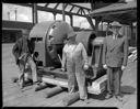 Charles Middleton with workers and new motor, circa 1947, #23726_1