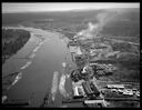 Aerial view of Chehalis River and the E. C. Miller Cedar Lumber Co. mill, 10/17/1948, #24594_1