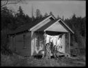 Exterior of Robert Underwood home with family at Taholah, 1/27/1942, #19105_1