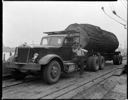 Man with truck and big log, 9/19/1941, #18720_1