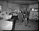 Interior of Underwood home with family at Taholah, 1/27/1942, #19106_1