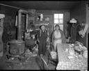 Jack and Martha Sam inside their Queets winter house, 1/30/1942, #19118_1