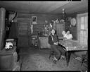 Native American couple inside house at Queets, 1/30/1942, #19120_1