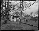 Native American couple outside house at Oakville, 2/4/1942, #19147_1