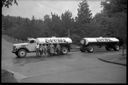 Family group with Everts'  tank truck and trailer, 8/1947, #23672_1